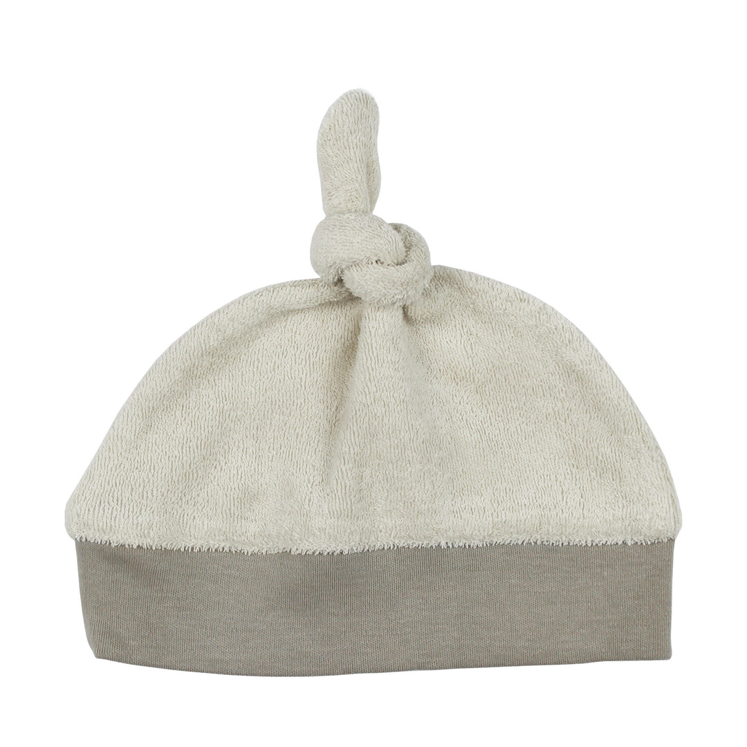 Organic Terry Cloth Banded Top-Knot Hat in Sand Castle, a medium tan color.