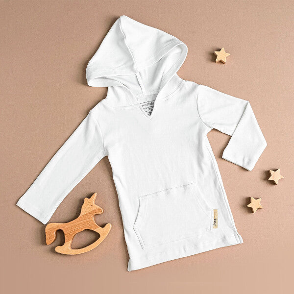 Organic Hoodie in White on a tan background.
