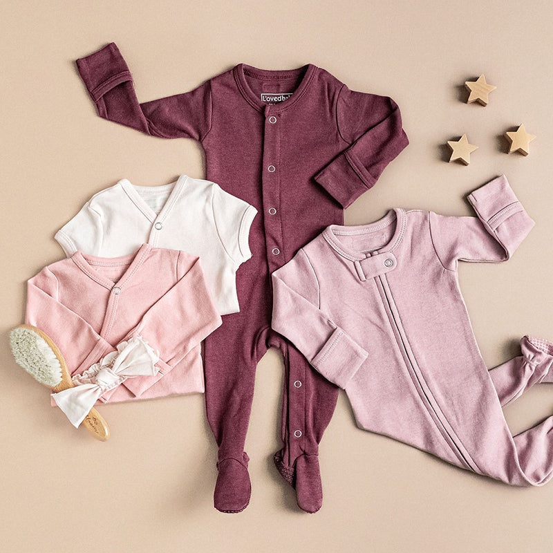 Assorted Organic Cotton Basics styles in shades of pink and purple.