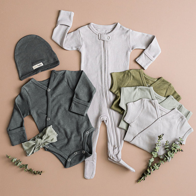 Assorted Organic Cotton Basics styles in shades of gray and green.