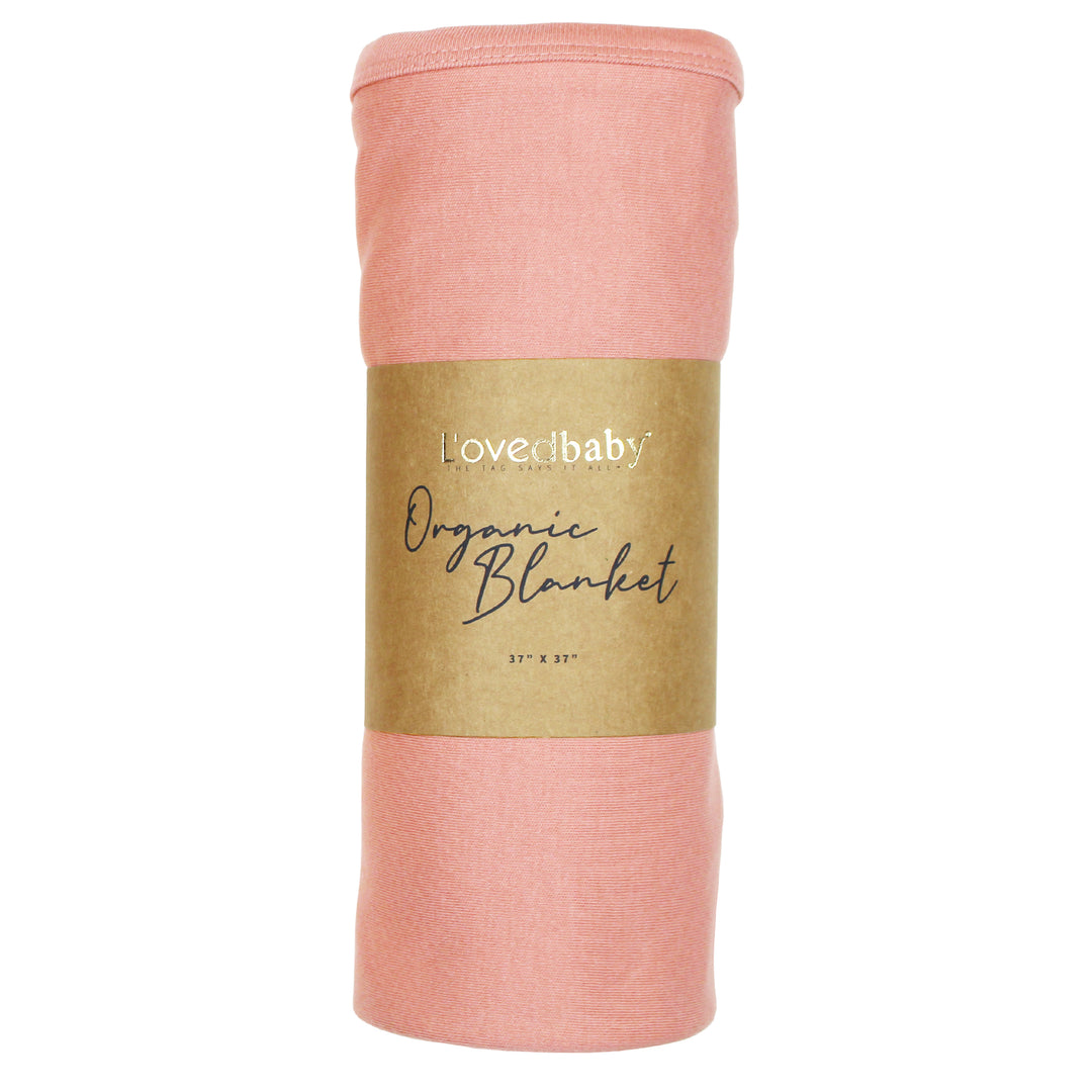image of rolled coral blanket in Kraft paper packaging