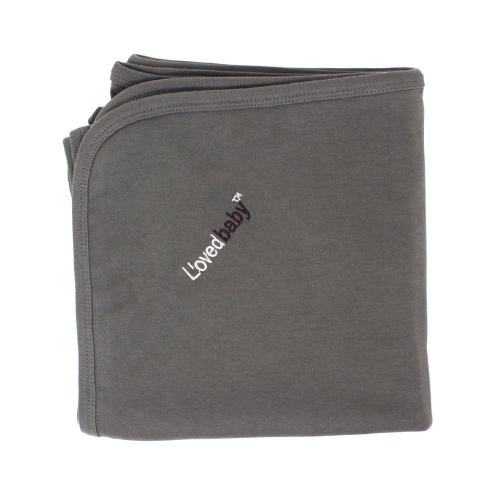 folded gray blanket laying flat