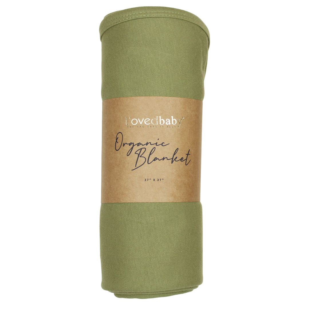 image of rolled sage blanket in Kraft paper packaging