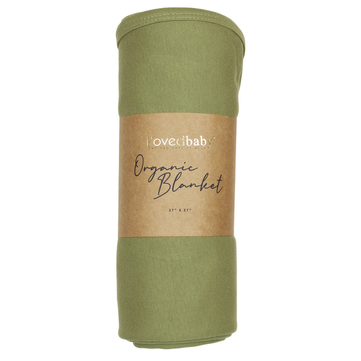 image of rolled sage blanket in Kraft paper packaging