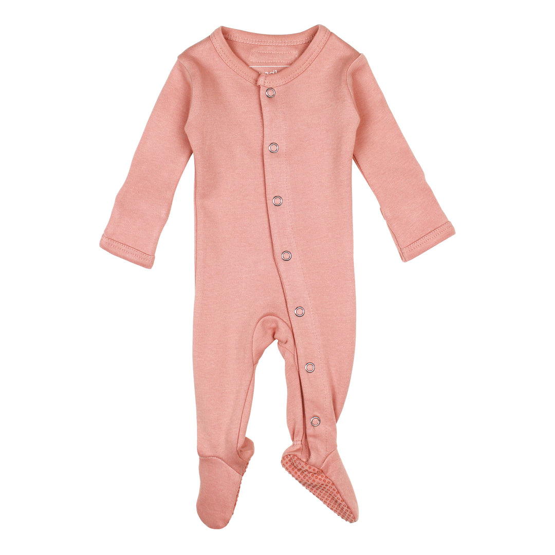 Organic Snap Footie in Coral, a salmon pink color.