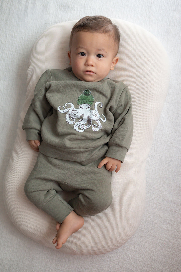 Child wearing Cozy Fleece Crewneck Sweatshirt in Octopus.