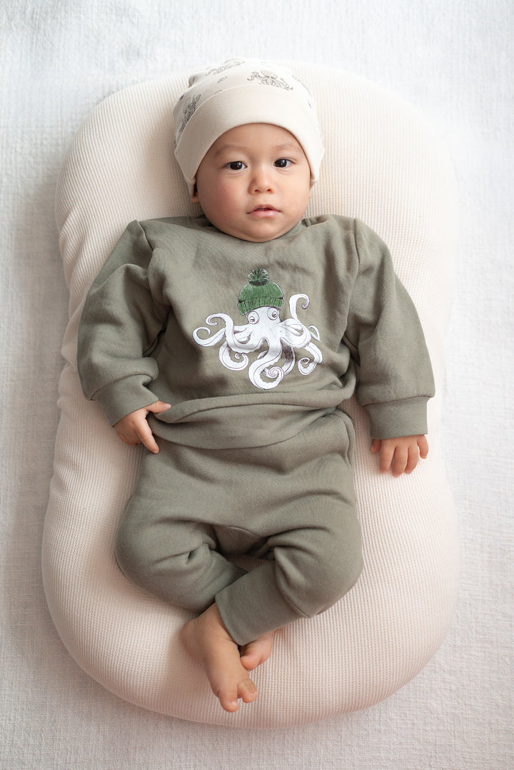 Child wearing Cozy Fleece Crewneck Sweatshirt in Octopus.