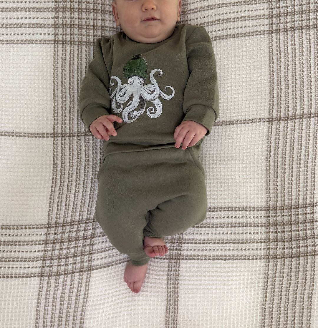 Child wearing Cozy Fleece Crewneck Sweatshirt in Octopus.