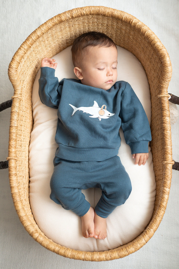 Child wearing Cozy Fleece Crewneck Sweatshirt in Sharks.