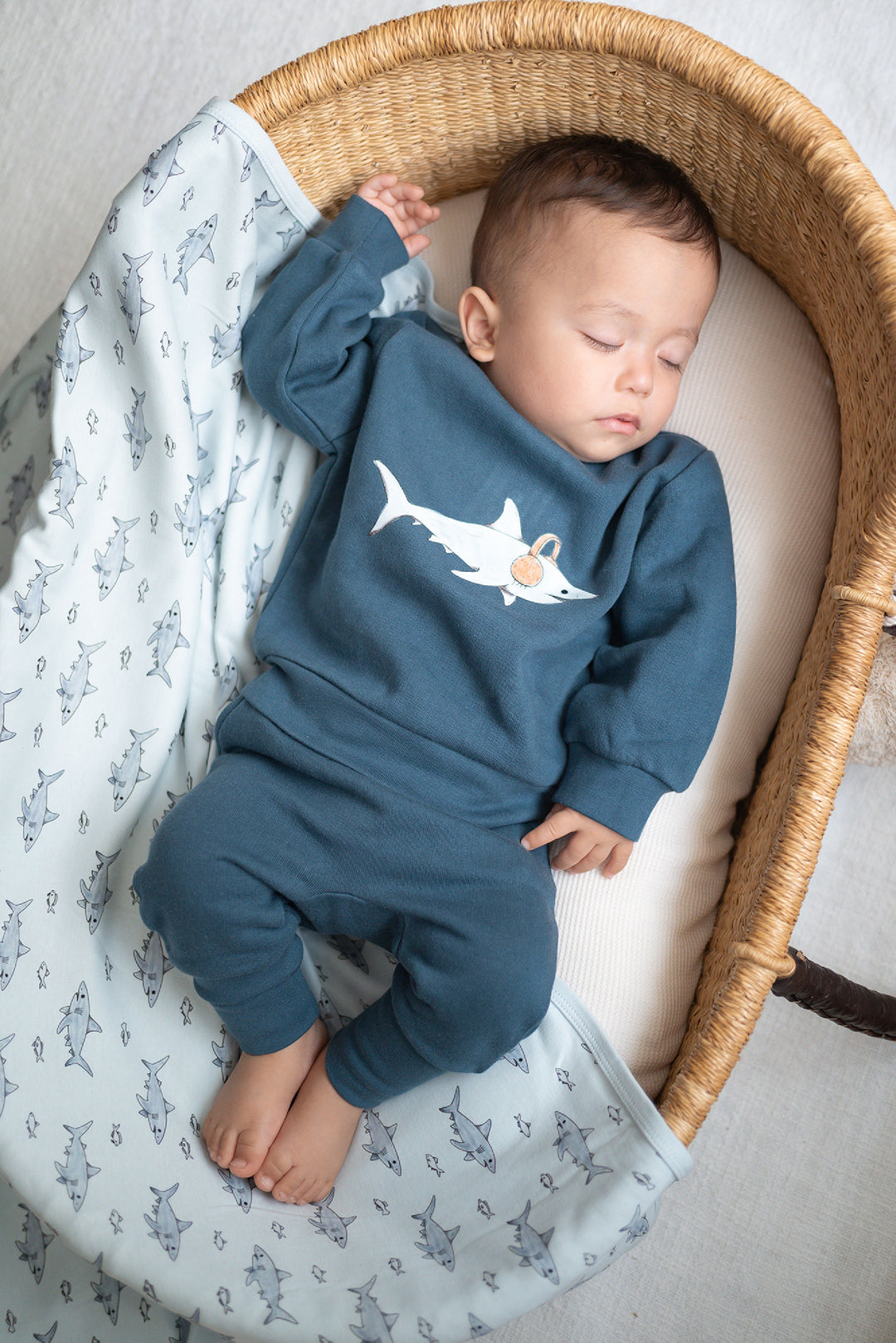 Child wearing a Cozy Fleece Jogger in Abyss.
