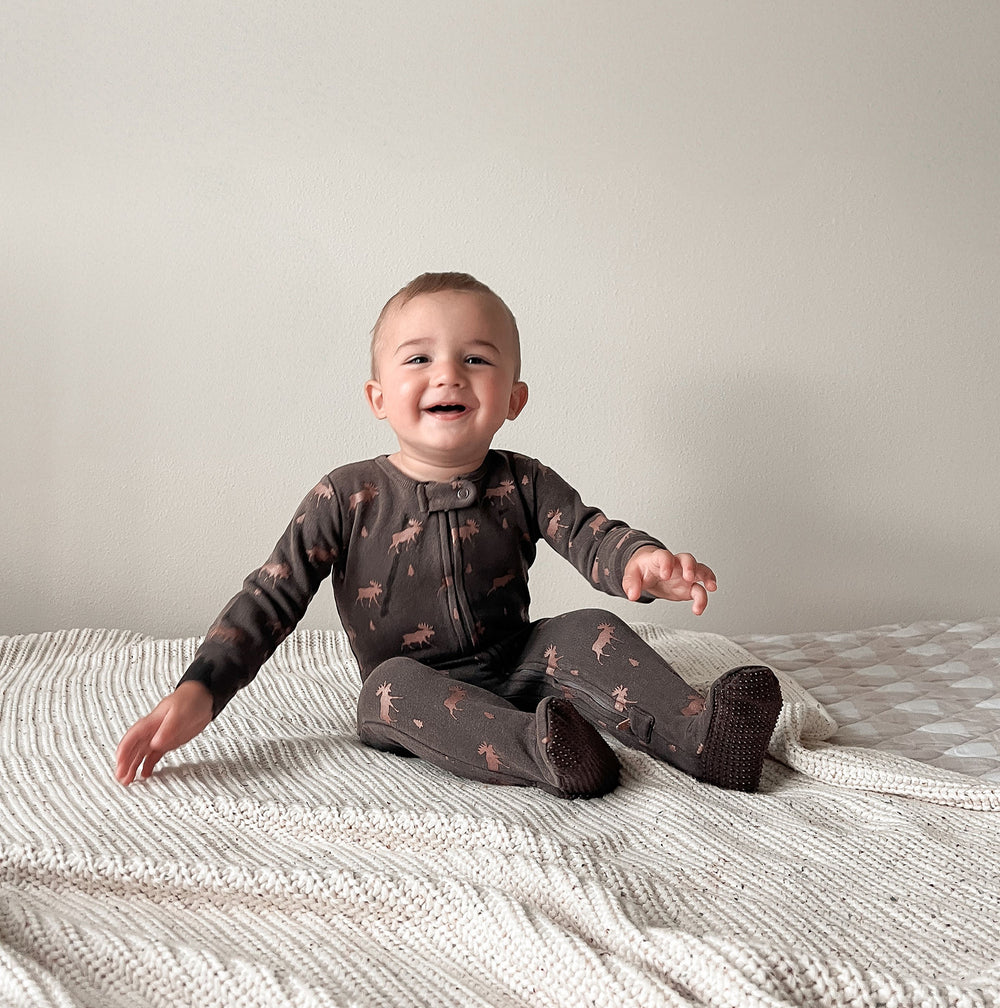Child wearing Organic Cozy 2-Way Zipper Footie in Bark Moose.