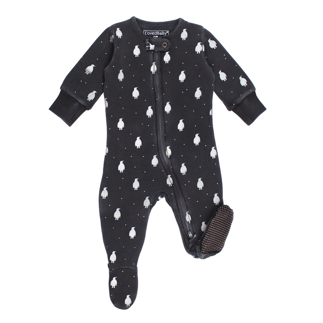 Black baby onesie with white penguin pattern on a white background