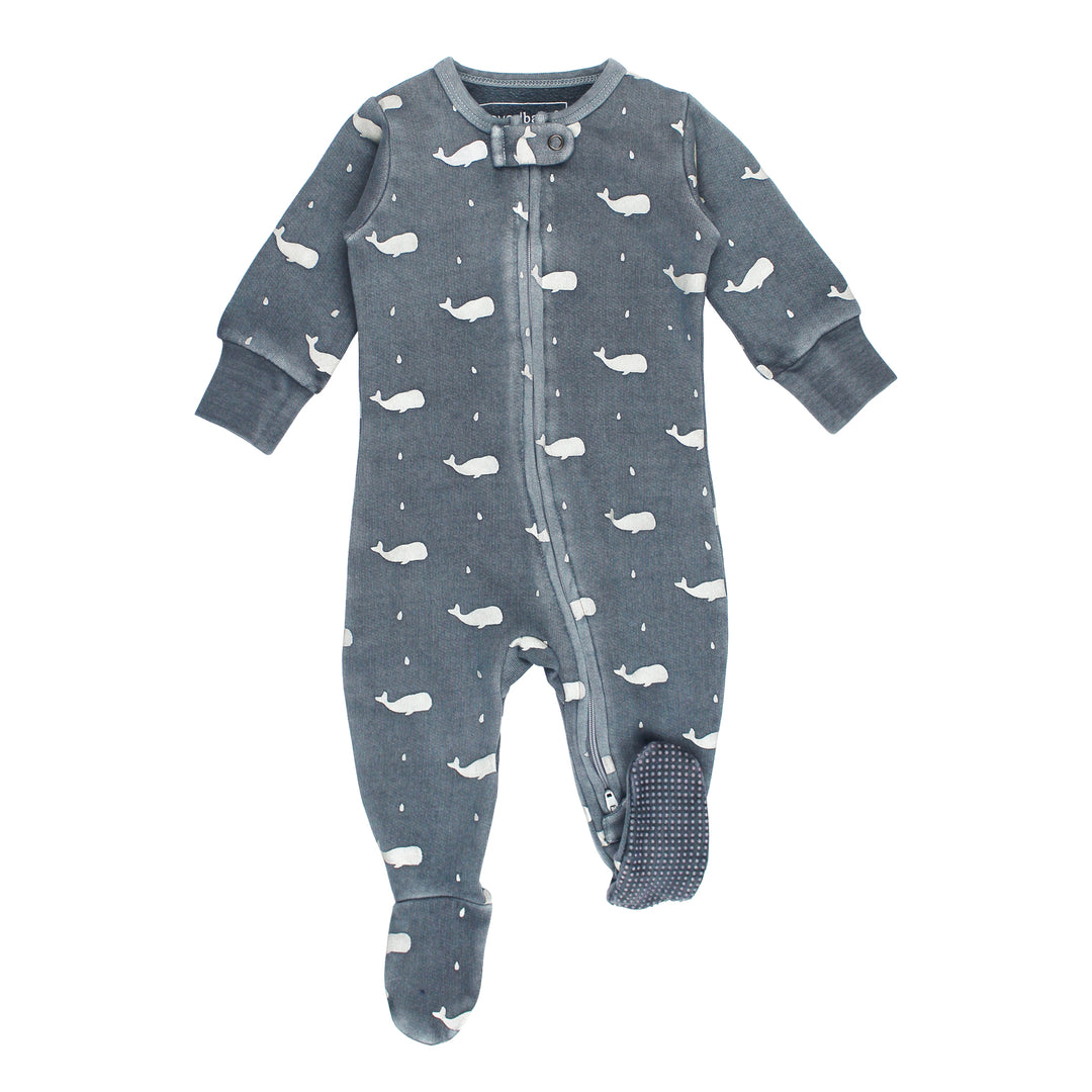 Gray baby onesie with whale pattern on a white background