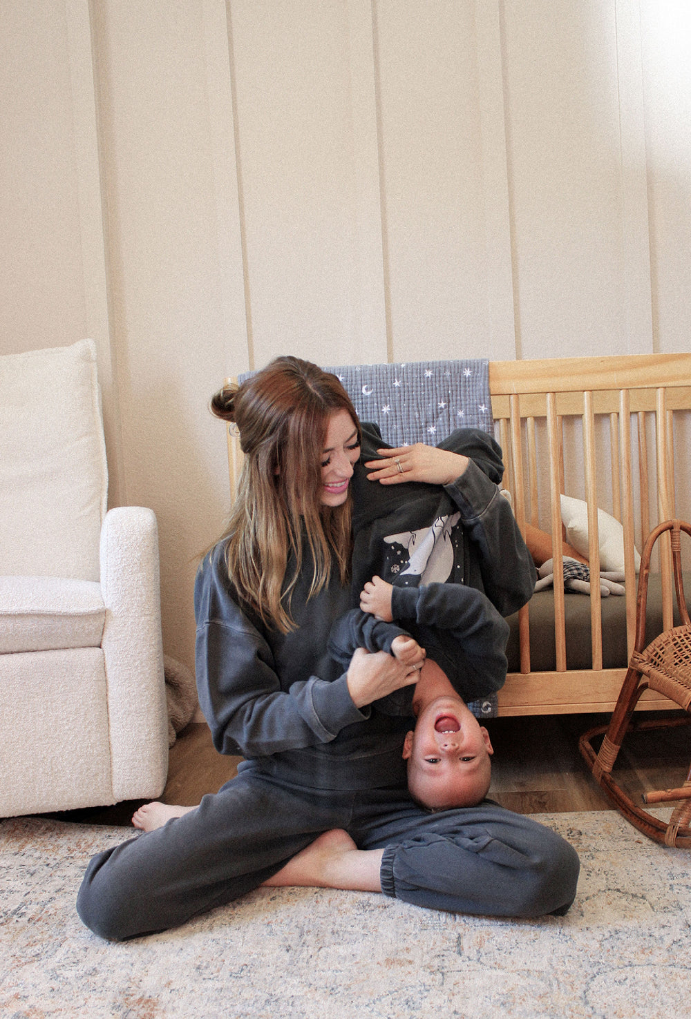 Child wearing Women's Organic Fleece Joggers in Coal.
