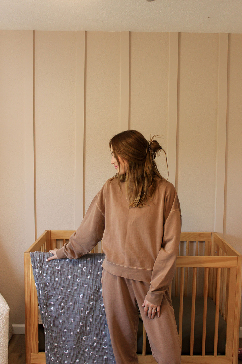 Child wearing Women's Organic Fleece Joggers in Latte.
