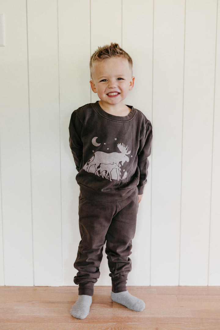 Child wearing Kids' Organic Cozy Graphic Sweatshirt & Jogger Set in Bark Moose 