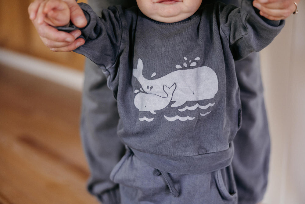 Child wearing Organic Cozy Graphic Sweatshirt & Jogger Set in Moonstone Whale.