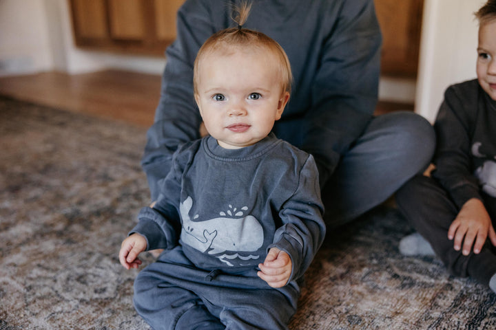 Child wearing Organic Cozy Graphic Sweatshirt & Jogger Set in Moonstone Whale.
