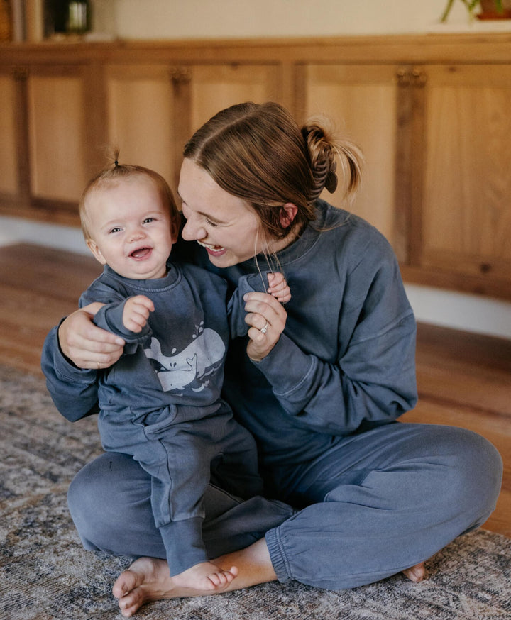 Child wearing Organic Cozy Graphic Sweatshirt & Jogger Set in Moonstone Whale.
