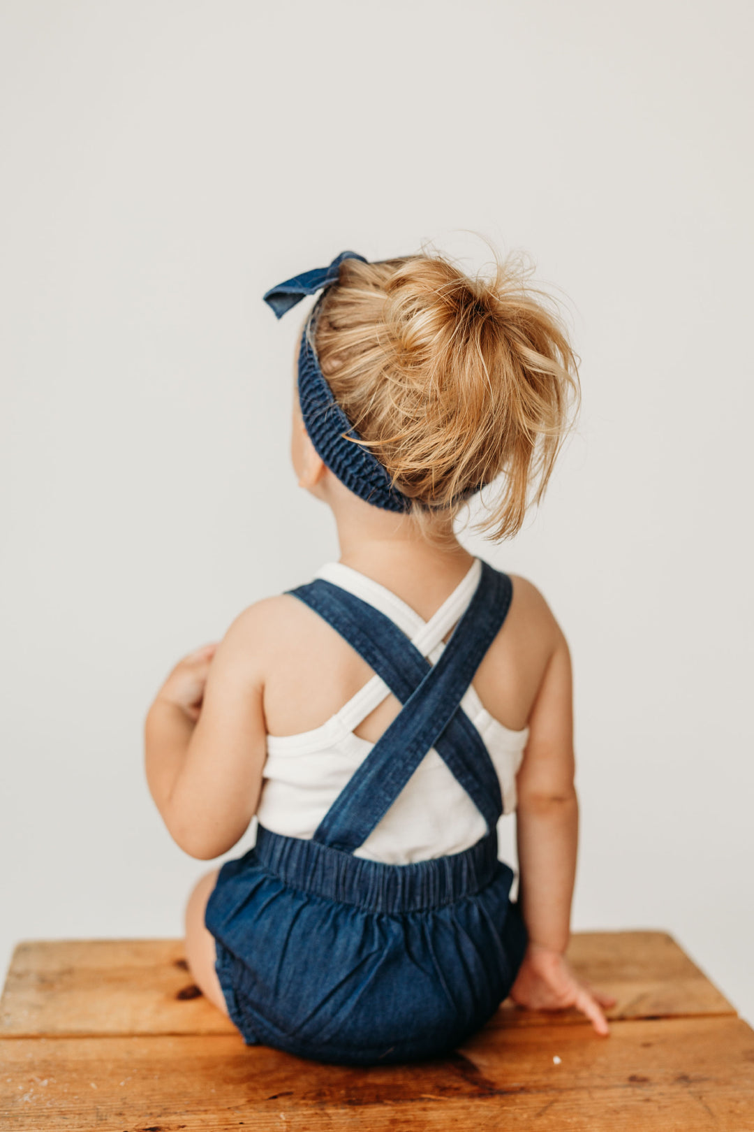 Child wearing Denim Bubble Overall in Denim.