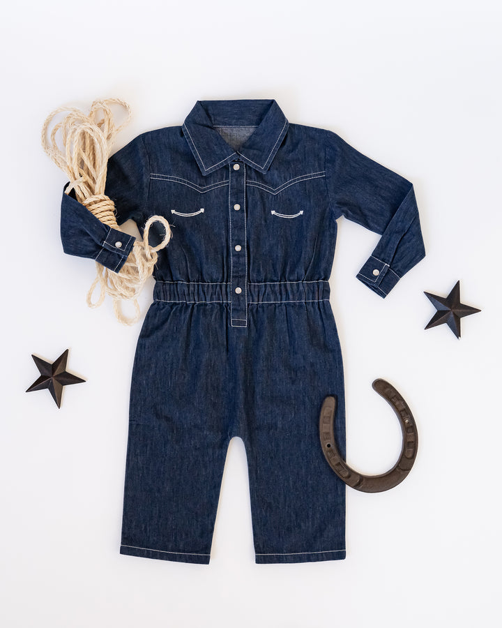 Child wearing Western Denim Long-Sleeve Romper in True Blue.