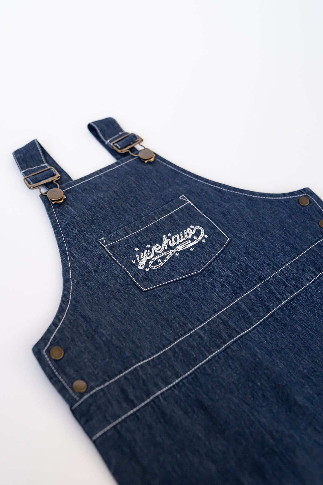 Child wearing Classic Denim Overall in True Blue.