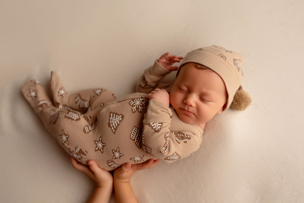 Child wearing Holiday Thermal 2-Way Zipper Footie & Cap Set in Ginger Glow.