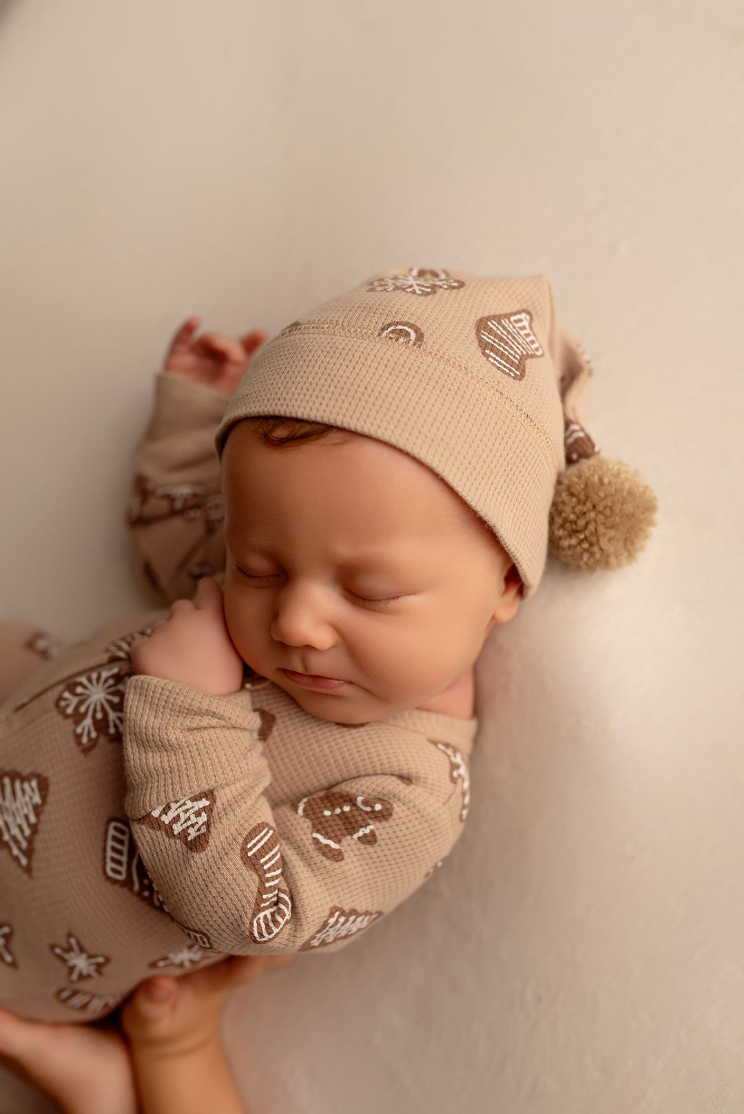 Child wearing Holiday Thermal 2-Way Zipper Footie & Cap Set in Ginger Glow.