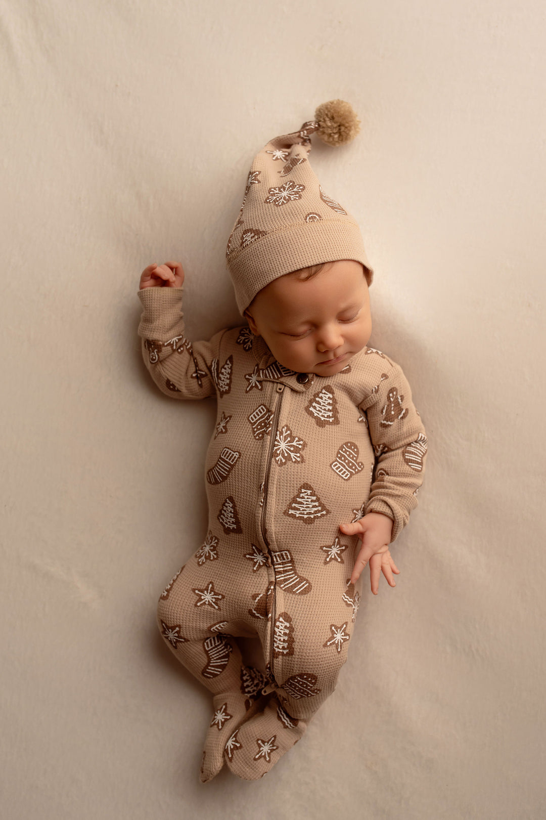 Child wearing Holiday Thermal 2-Way Zipper Footie & Cap Set in Ginger Glow.
