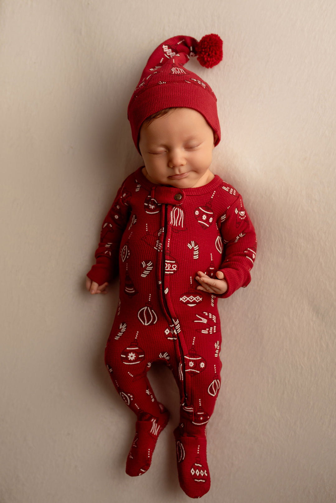 Child wearing Holiday Thermal 2-Way Zipper Footie & Cap Set in Ornamini.