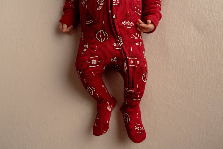 Child wearing Holiday Thermal 2-Way Zipper Footie & Cap Set in Ornamini.