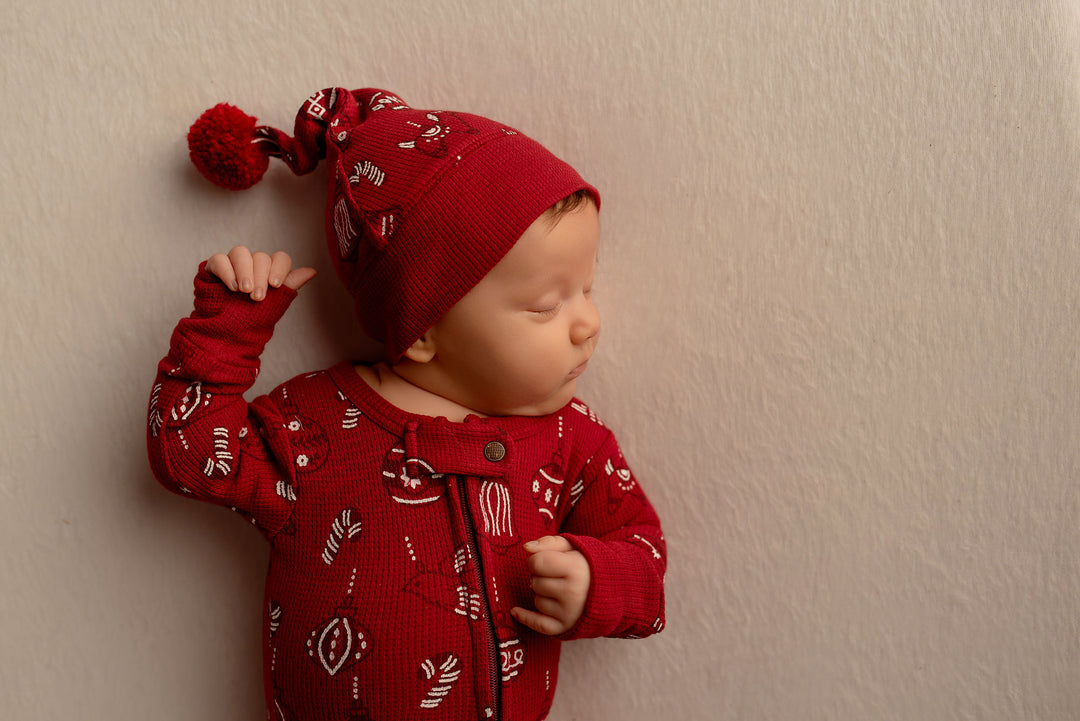 Child wearing Holiday Thermal 2-Way Zipper Footie & Cap Set in Ornamini.