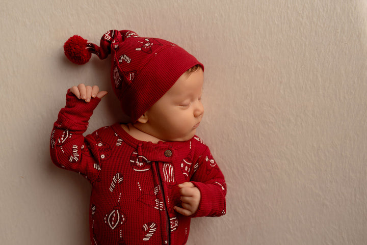 Child wearing Holiday Thermal 2-Way Zipper Footie & Cap Set in Ornamini.