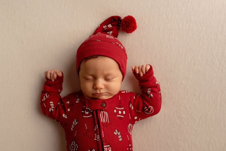 Child wearing Holiday Thermal 2-Way Zipper Footie & Cap Set in Ornamini.