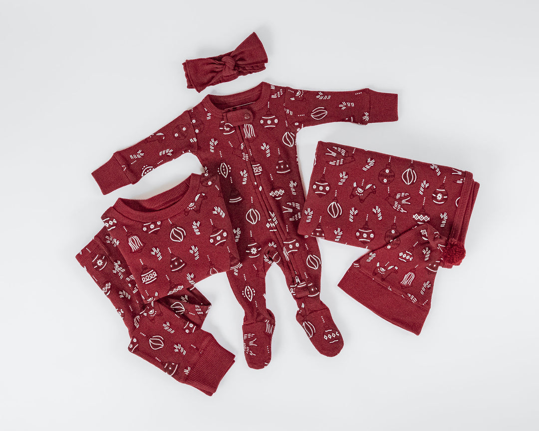Child wearing Holiday Thermal 2-Way Zipper Footie & Cap Set in Ornamini.