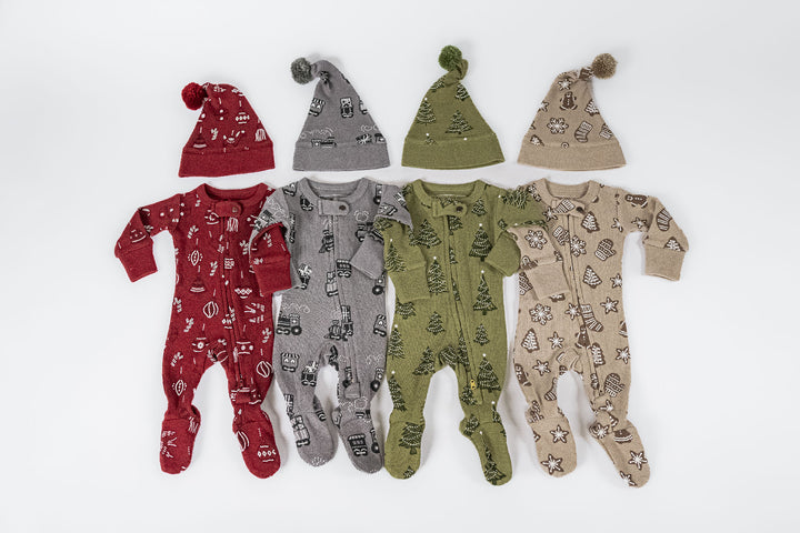 Child wearing Holiday Thermal 2-Way Zipper Footie & Cap Set in Twinkle Tree.
