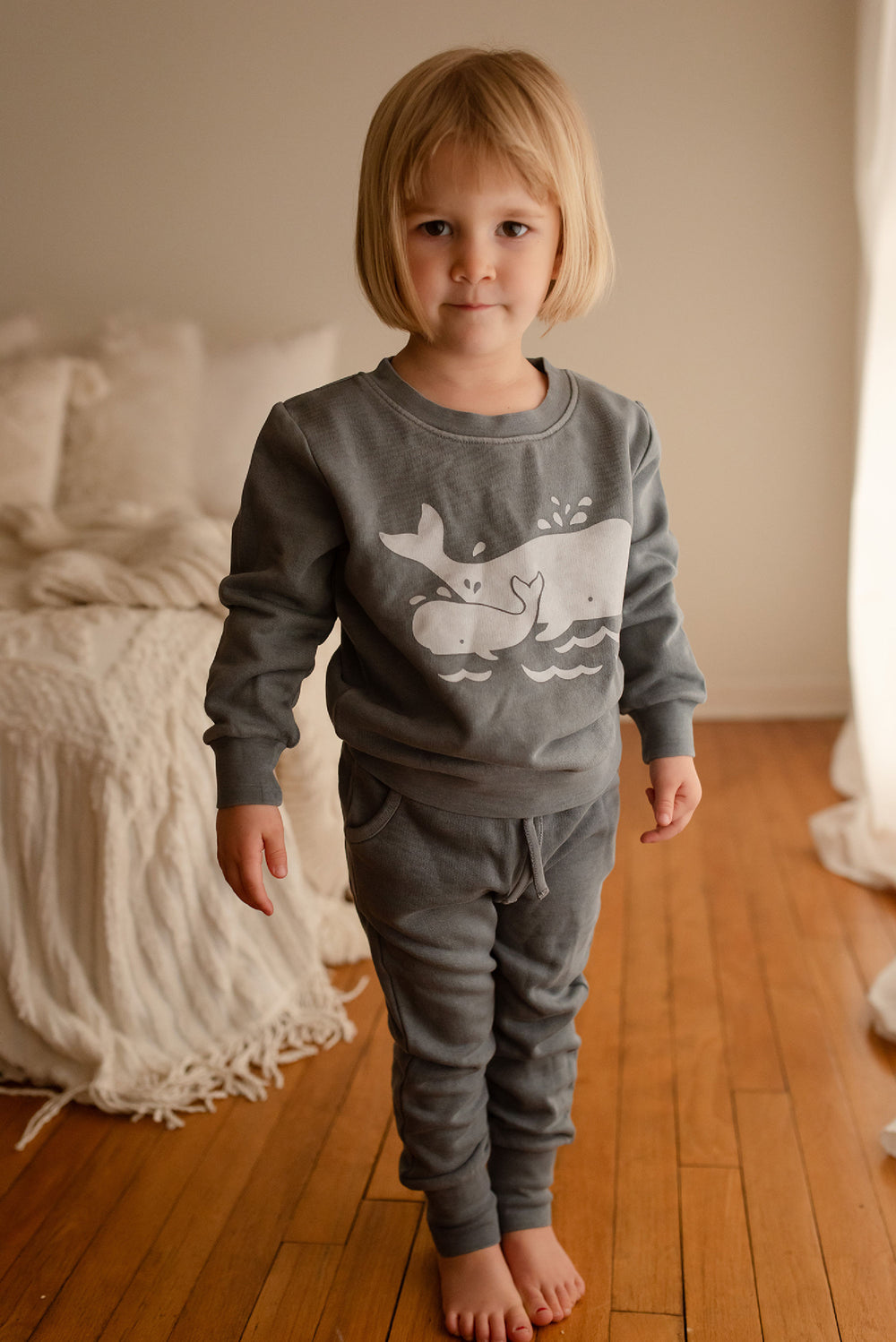 Child wearing Kids' Organic Cozy Graphic Sweatshirt & Jogger Set in Moonstone Whale.