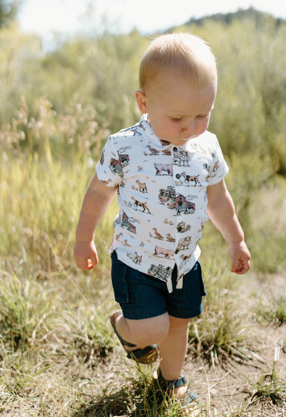 Child wearing Kids' Denim Cargo Short in Denim.
