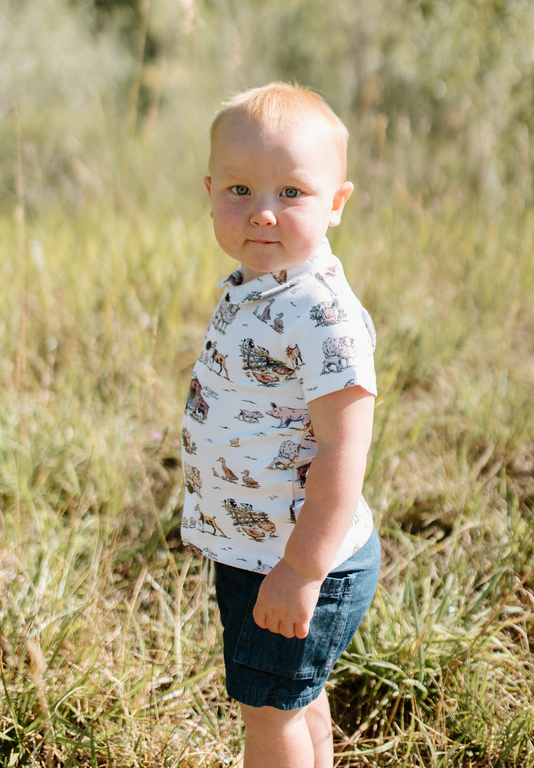 Child wearing Kids' Denim Cargo Short in Denim.