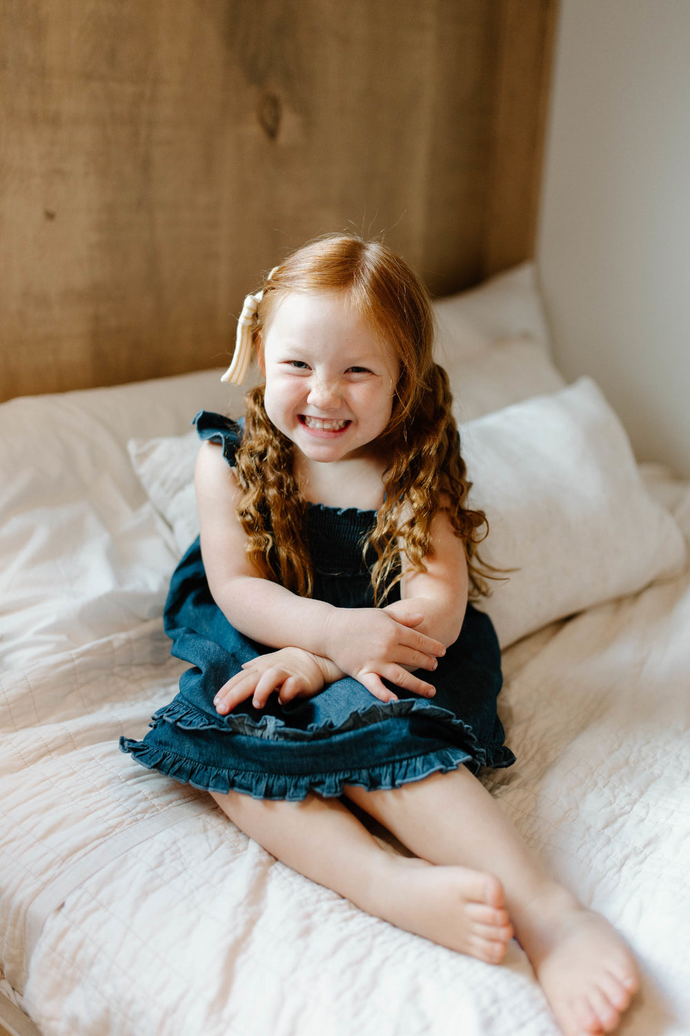 Child wearing Kids' Denim Summer Dress in Denim.