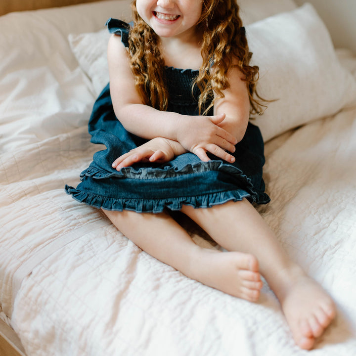 Child wearing Kids' Denim Summer Dress in Denim.