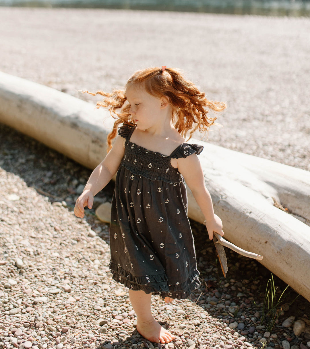 Child wearing Kids' Organic Muslin Summer Dress in Chia Anchor.
