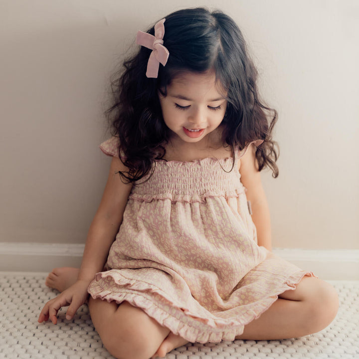 Child wearing Printed Muslin Summer Dress in Carnation Floral.