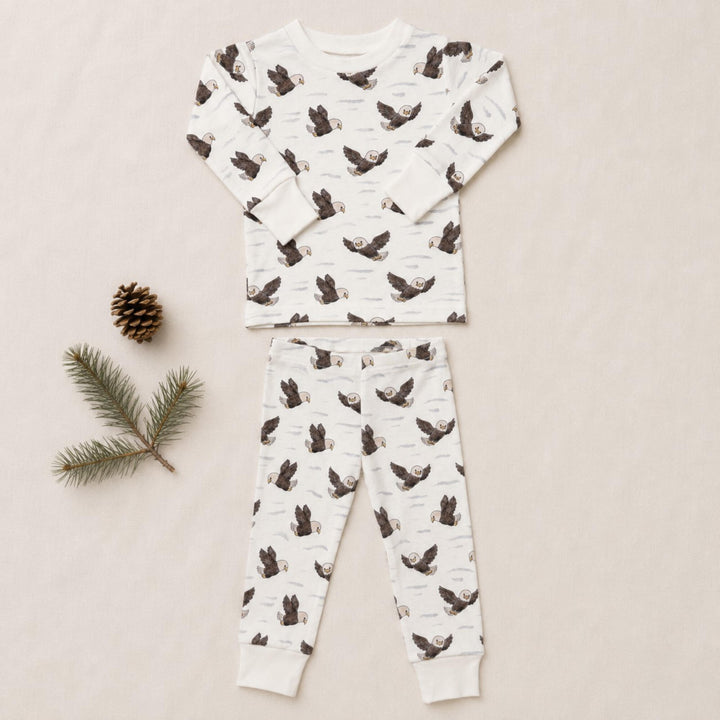Child wearing Kids' Organic L/Sleeve PJ Set in Bald Eagle.