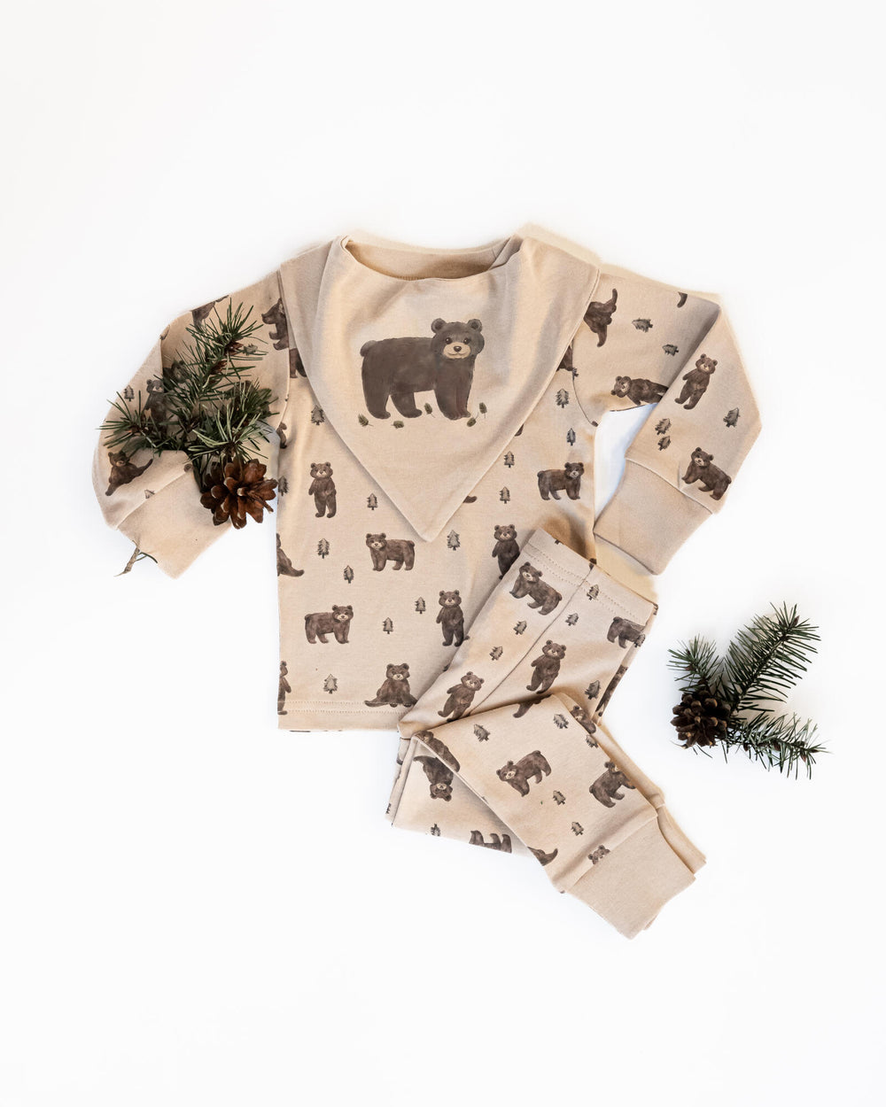 Child wearing Kids' Organic L/Sleeve PJ Set in Black Bear.