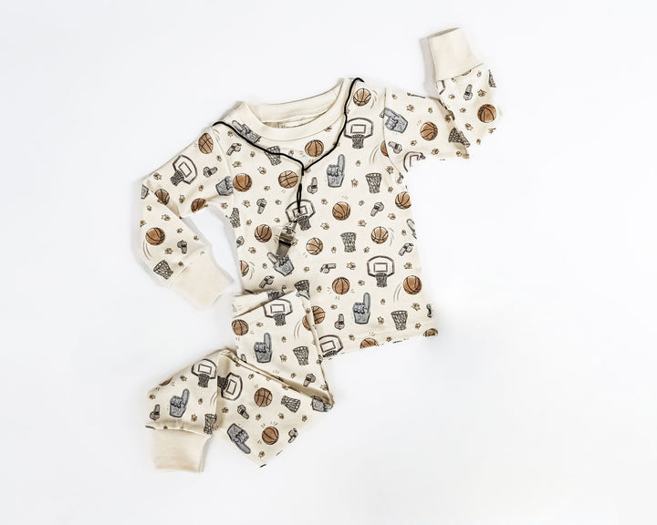 Child wearing Kids' Organic L/Sleeve PJ Set in Hoops.