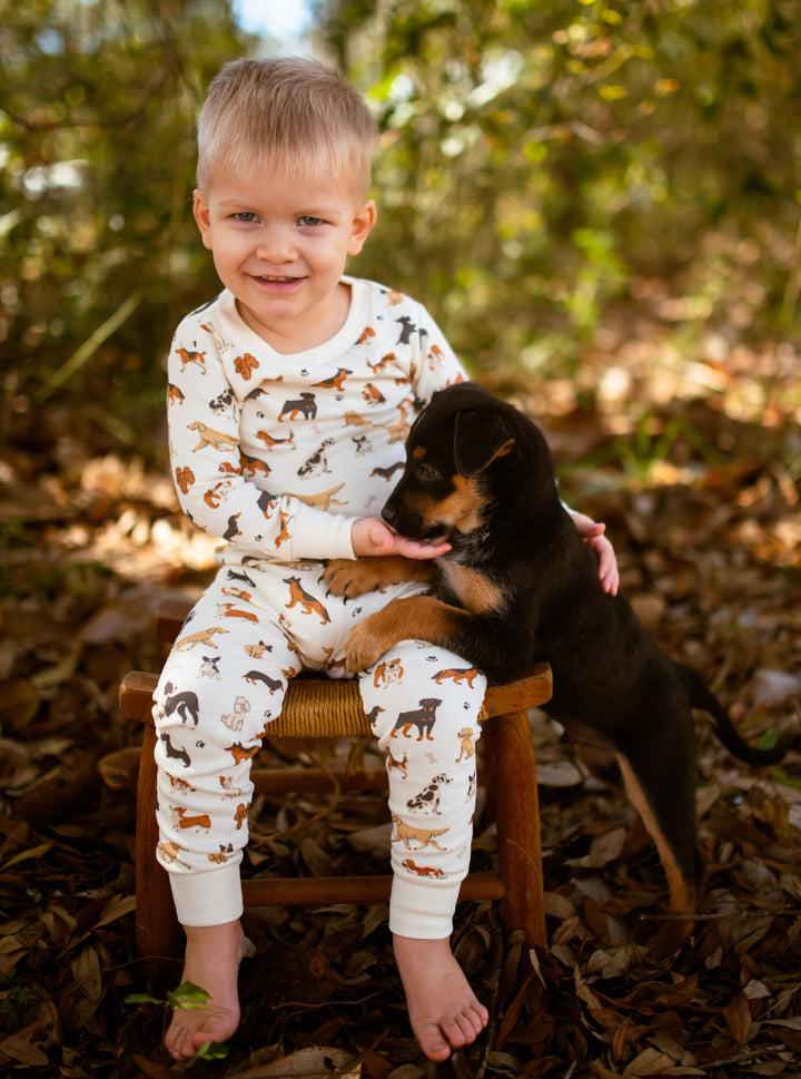 Child wearing Kids' Organic L/Sleeve PJ Set in Puppy Love.