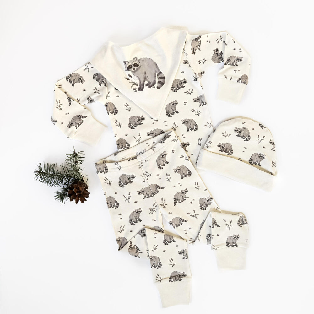 Child wearing Kids' Organic L/Sleeve PJ Set in Raccoon.