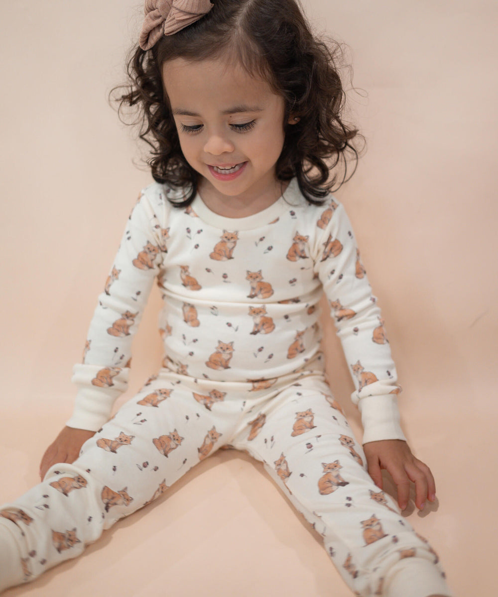 Child wearing Kids' Organic L/Sleeve PJ Set in Red Fox.