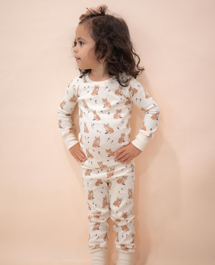 Child wearing Kids' Organic L/Sleeve PJ Set in Red Fox.